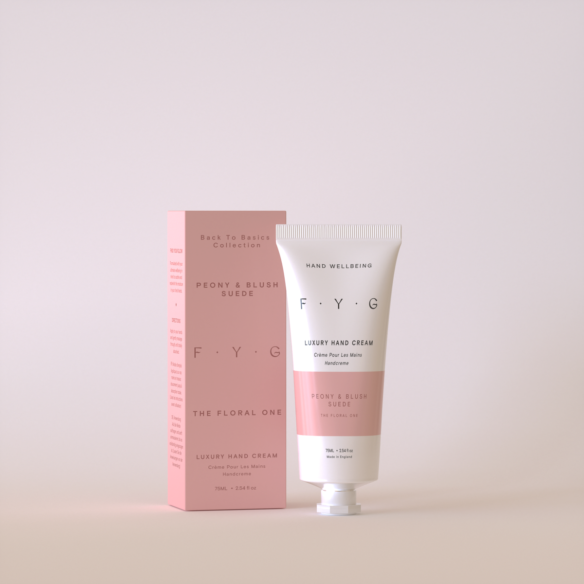 FYG Peony & Blush Suede luxury hand cream with packaging on a light beige background