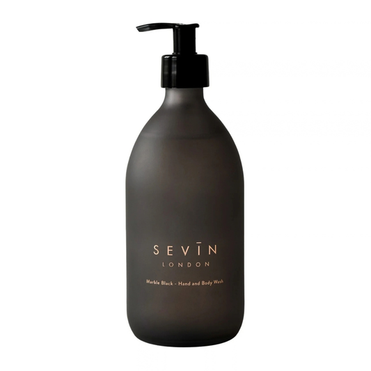 A dark charcoal gray pump bottle of SEVIN LONDON Head and Body Wash on a solid white background.
